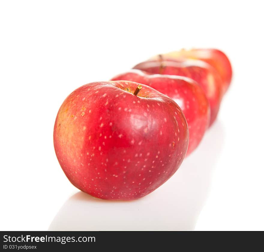 Fresh red juicy natural apples on white isolated background. Fresh red juicy natural apples on white isolated background