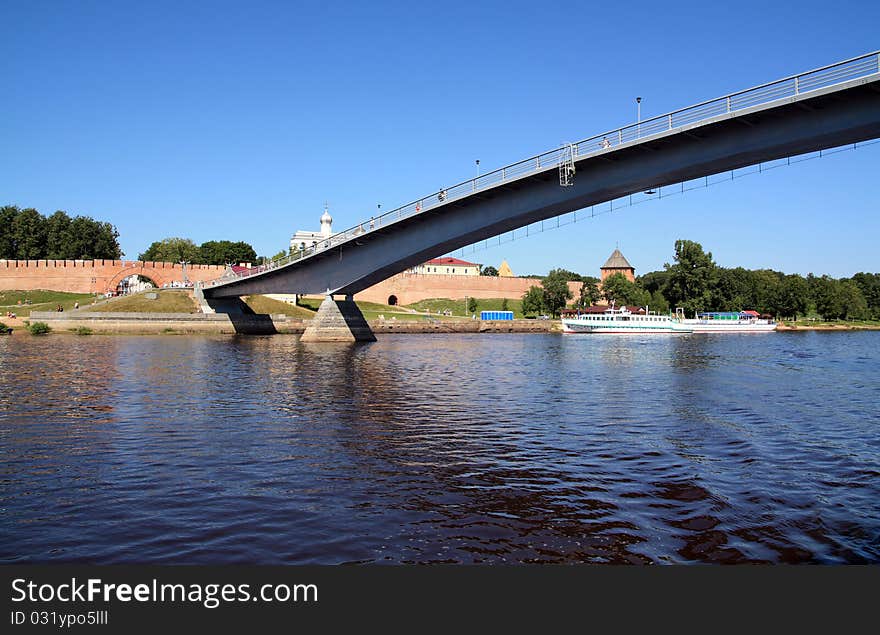 Pedestrian bridge across the wide river