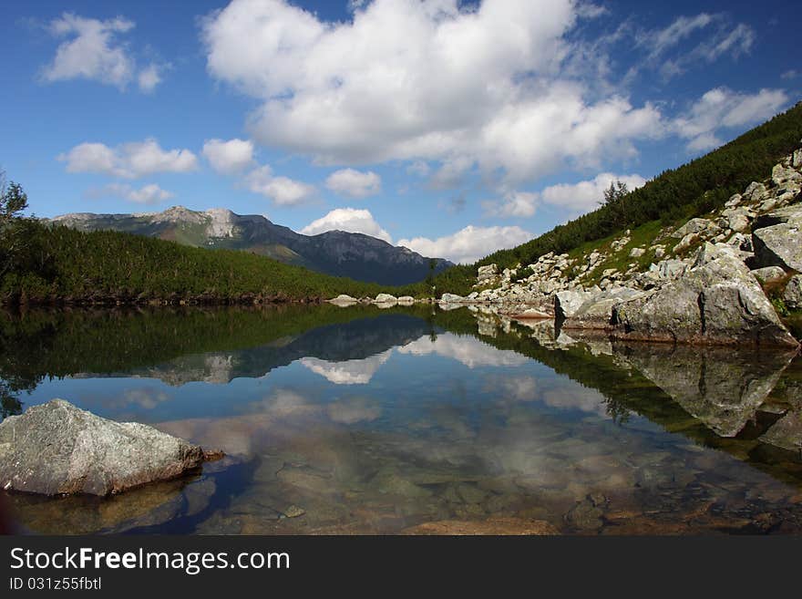 Mirror lake Cierne pleso in High Tatras, Slovakia.