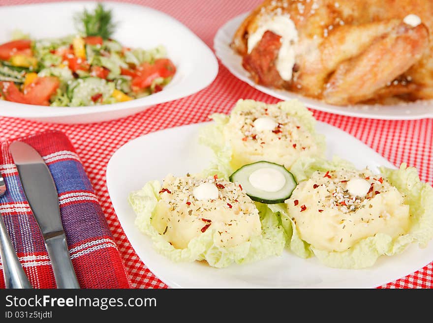 Mashed potatoes and fried chicken on the table