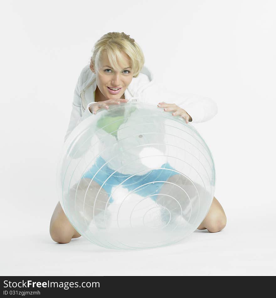 Kneeling young woman doing exercises