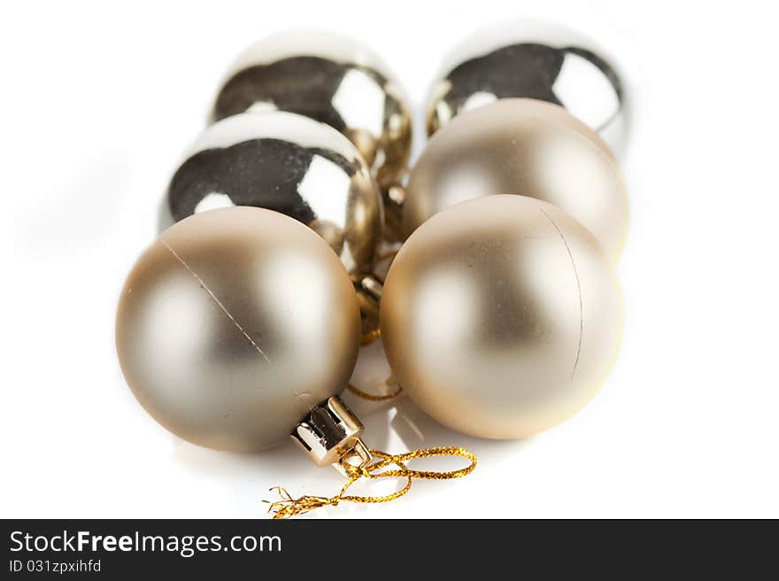 Six golden christmas decorative baubles isolated on white. Six golden christmas decorative baubles isolated on white