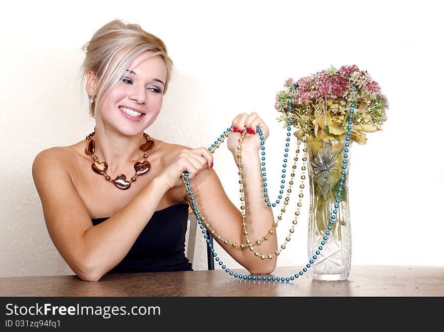 Woman with autumn flowers