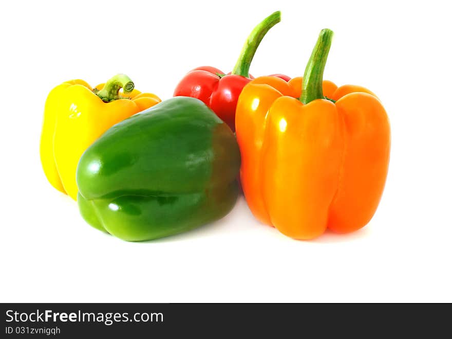 Four sweet peppers on a white background. Four sweet peppers on a white background