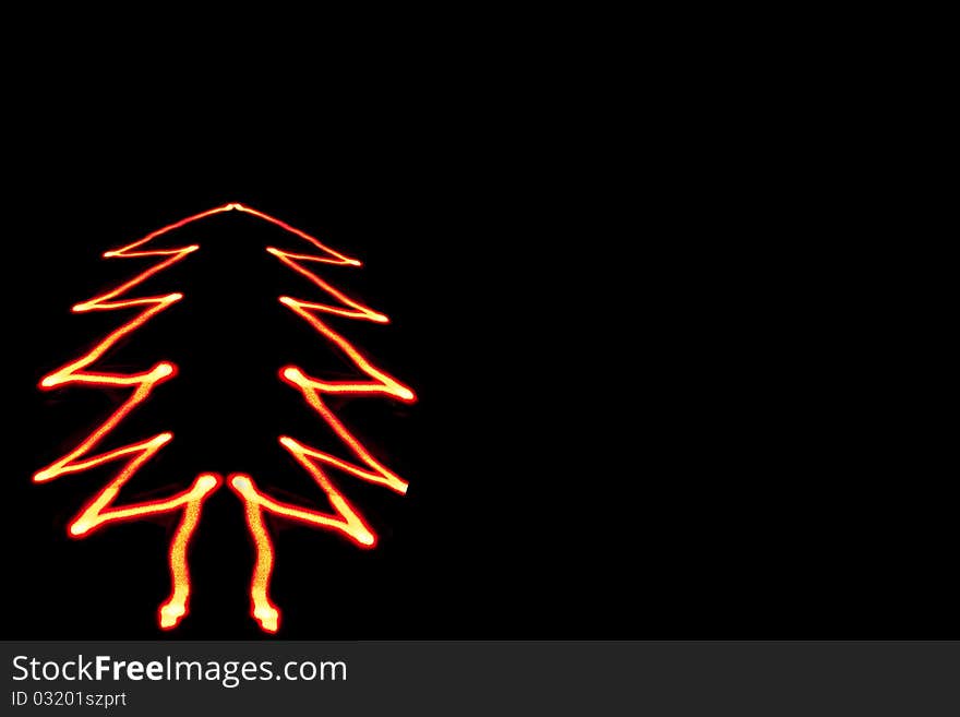 Lighting drawing of Christmas tree on black background