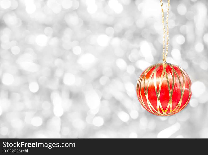 Red christmas ball on white reflect background. Red christmas ball on white reflect background