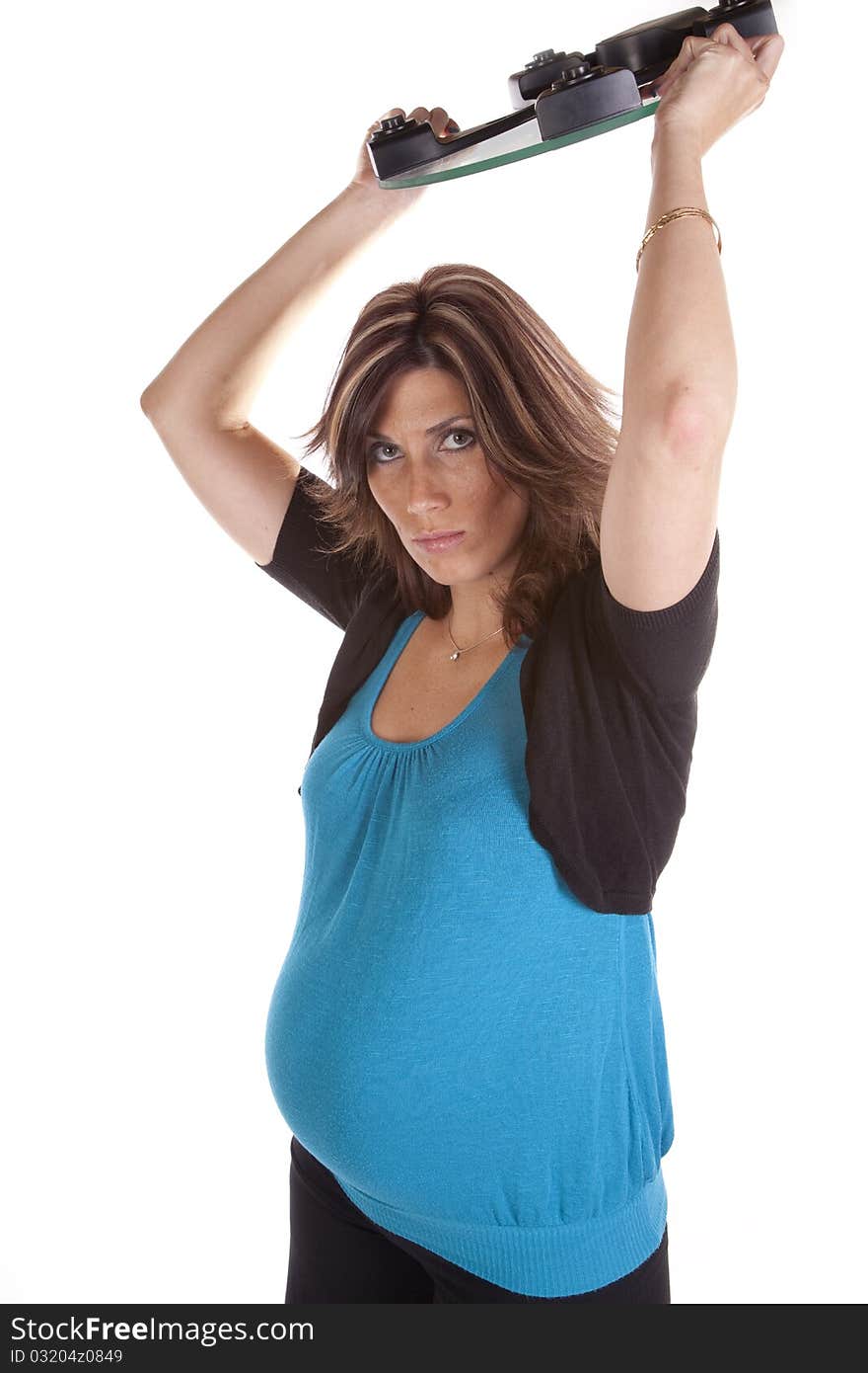 Pregnant woman throwing scales