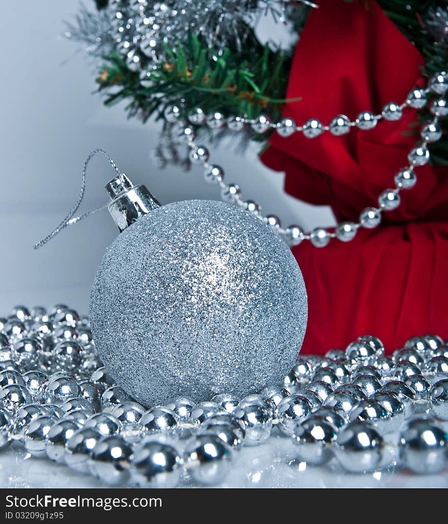 Christmas tree, white background, blue ball on the front. Christmas tree, white background, blue ball on the front