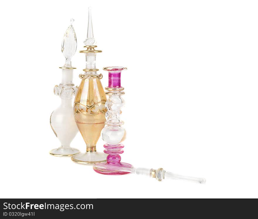 Three perfume bottles isolated