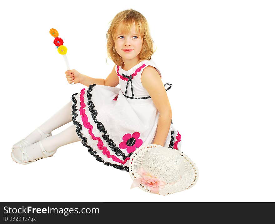 Portrait of little girl with lollipops isolated on the white background. Portrait of little girl with lollipops isolated on the white background.