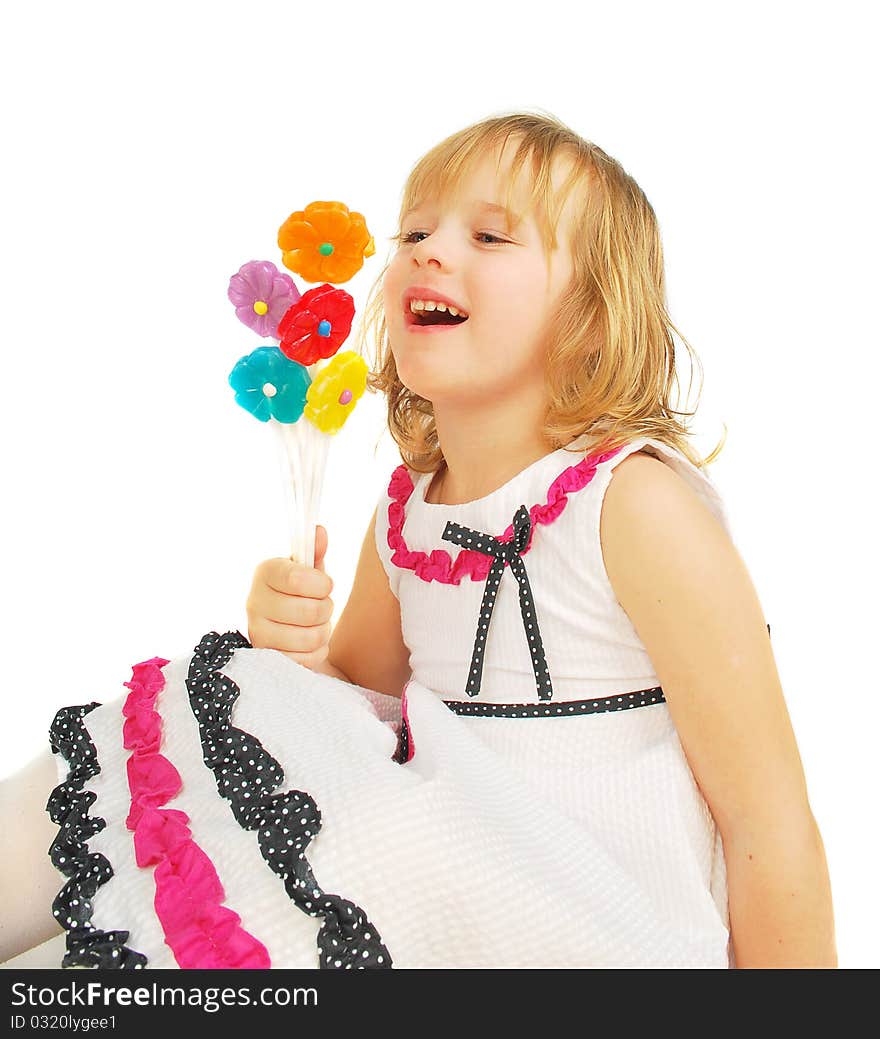 Portrait of little girl with lollipops isolated on the white background. Portrait of little girl with lollipops isolated on the white background.