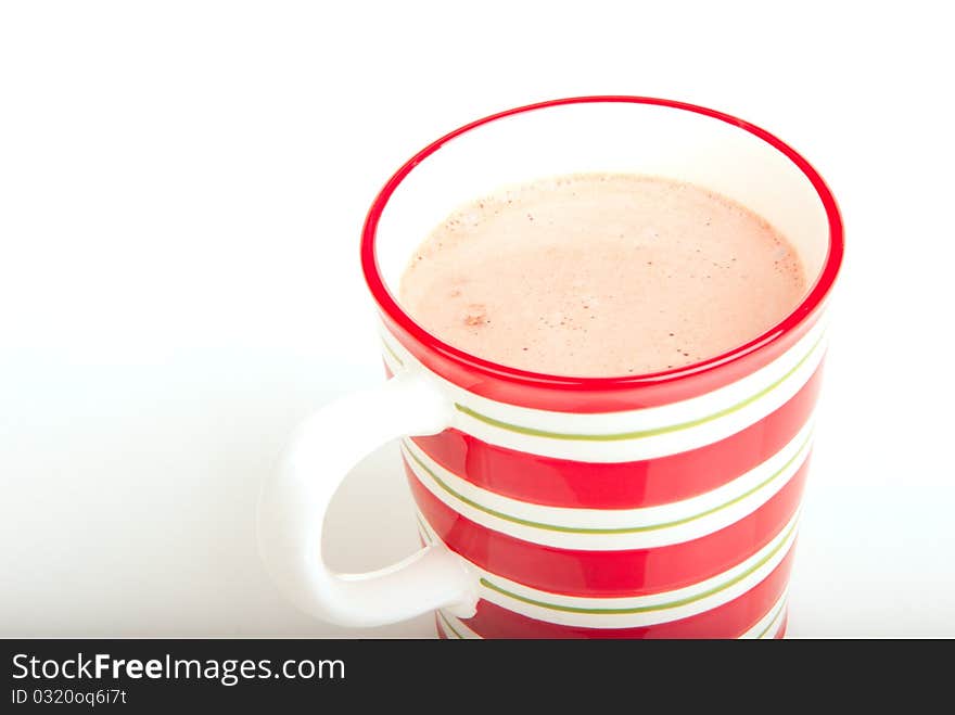 Red striped Christmas cup with with hot chocolate isolated on a white background. Red striped Christmas cup with with hot chocolate isolated on a white background