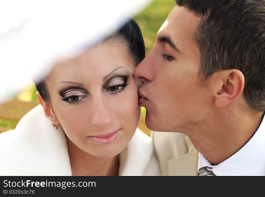 Groom Kissing Bride