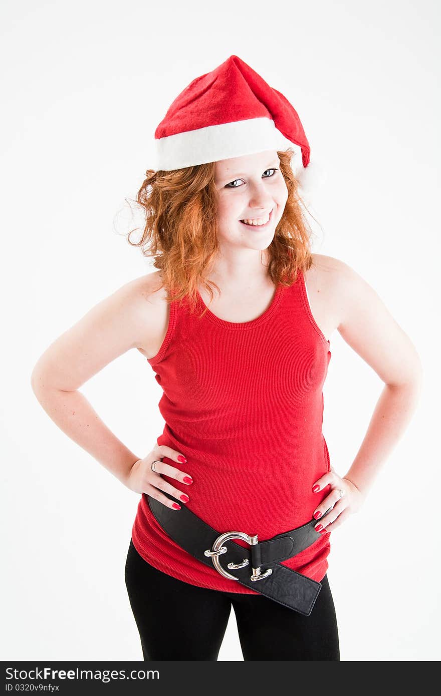 Beautiful teen girl in red and black santa costume. Beautiful teen girl in red and black santa costume