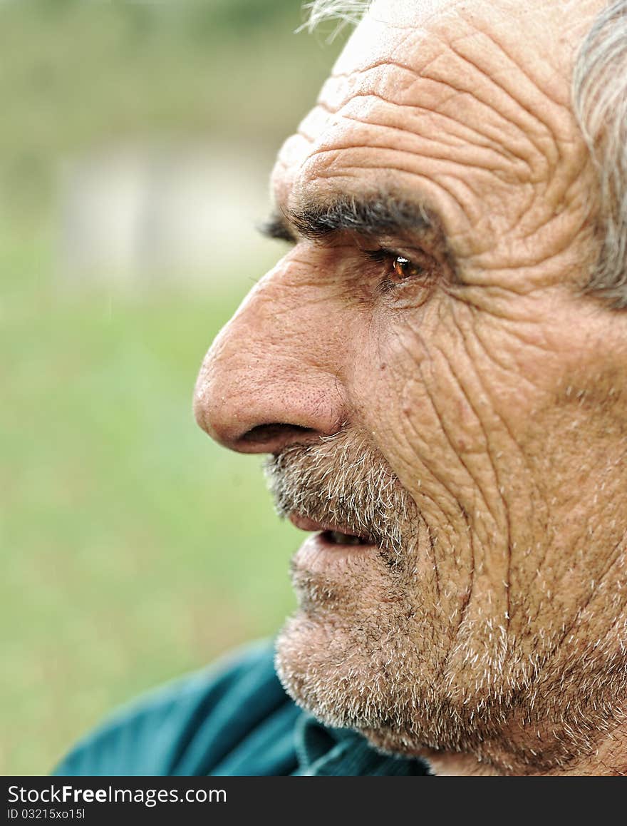 Senior man looking off into distance - profile