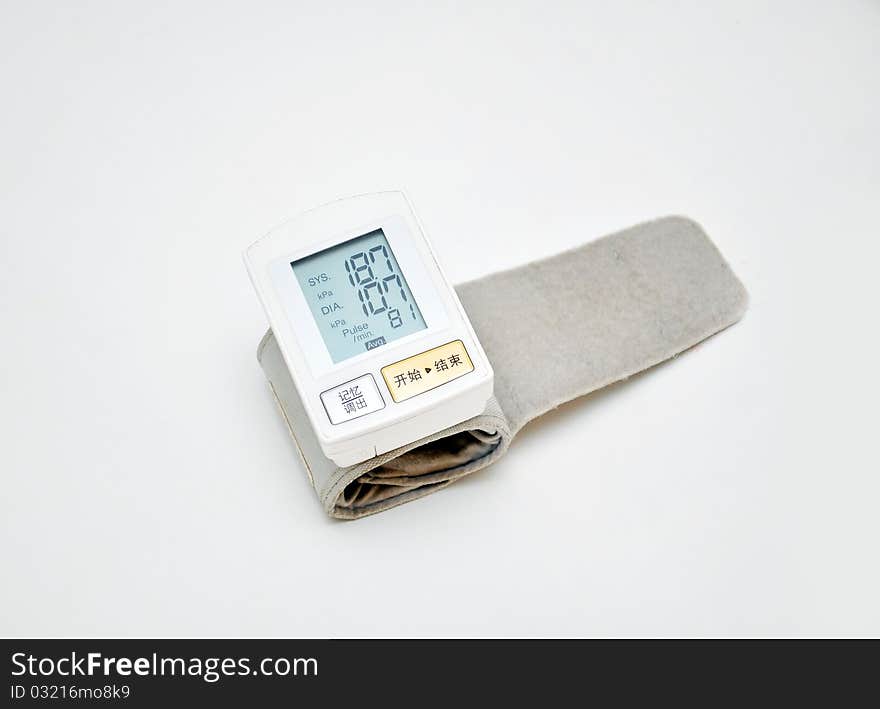 Blood pressure monitor on a white background. Blood pressure monitor on a white background