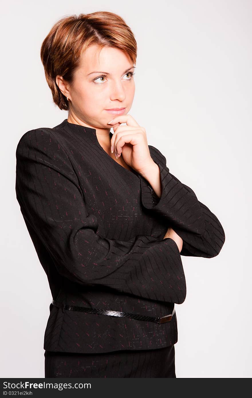 Photo of a busines woman thinking about something. Photo of a busines woman thinking about something