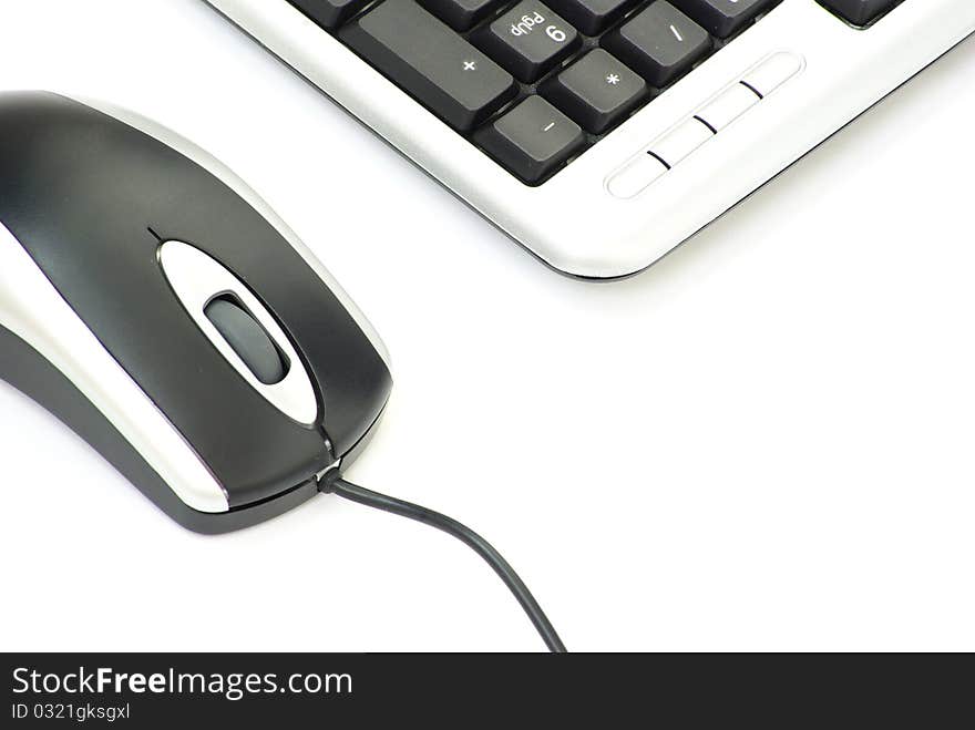 Computer mouse and keyboard isolated on white