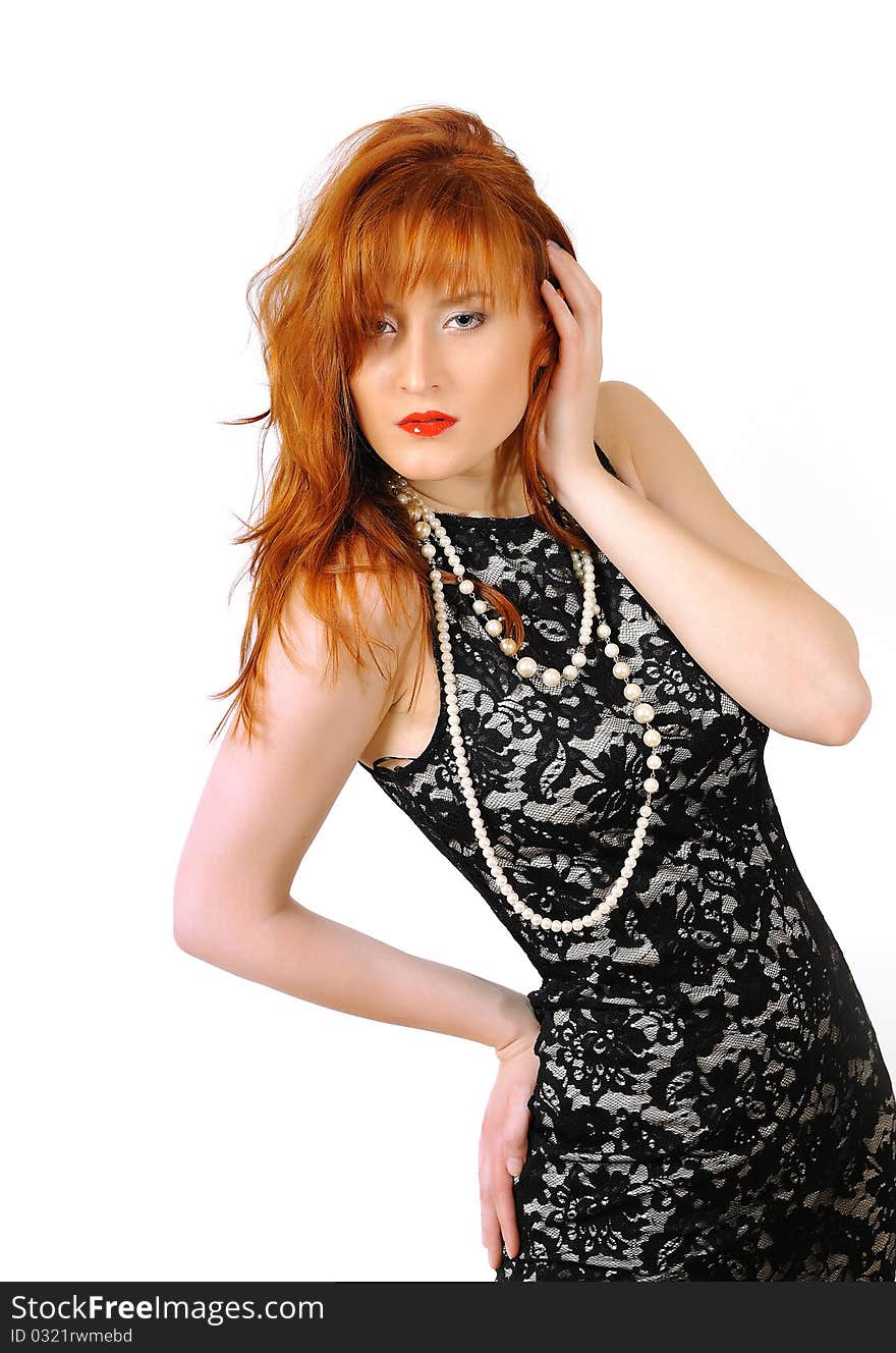 Beautiful red haired woman in lace black dress