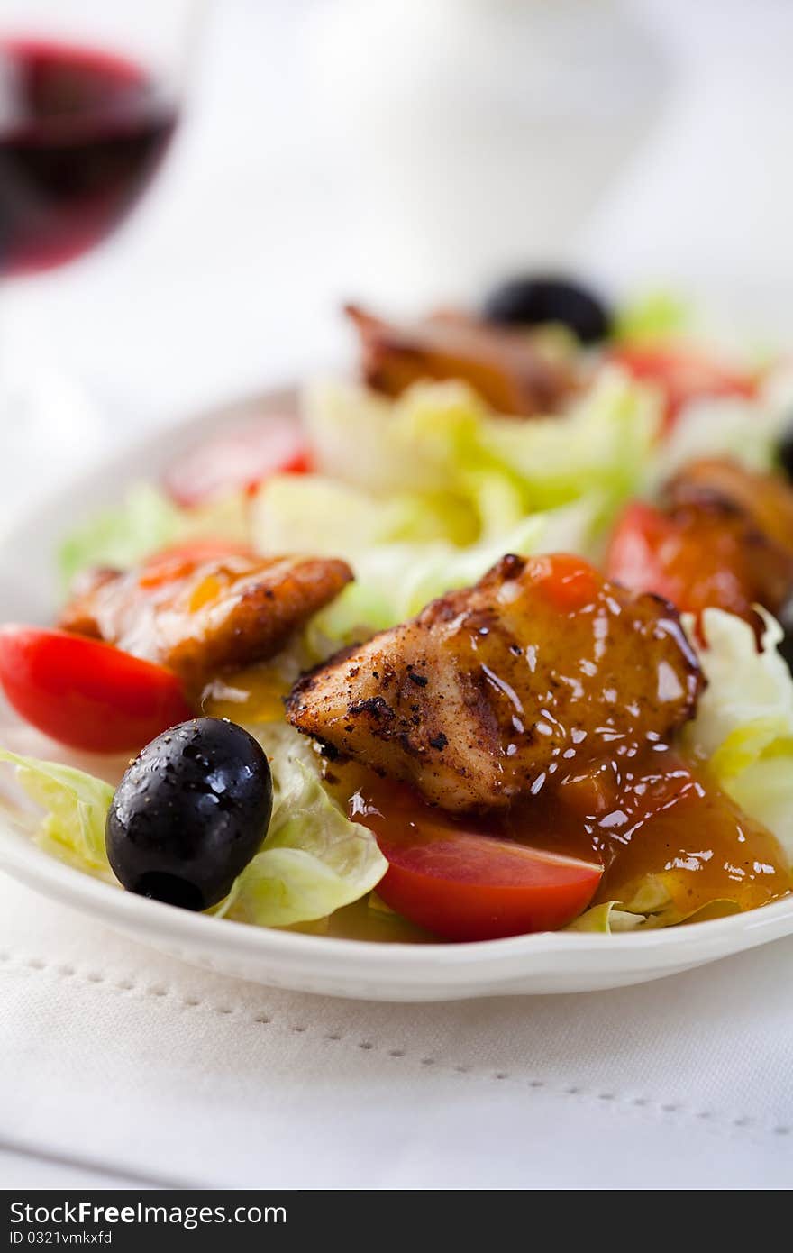 Closeup of chicken-vegetable salad with hot sauce. Closeup of chicken-vegetable salad with hot sauce