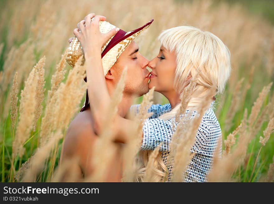 Embracing outdoor in cornfield looking happy. Embracing outdoor in cornfield looking happy