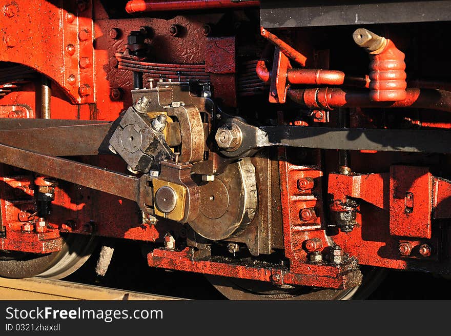 Closeup of vintage steam engine's, iron wheel