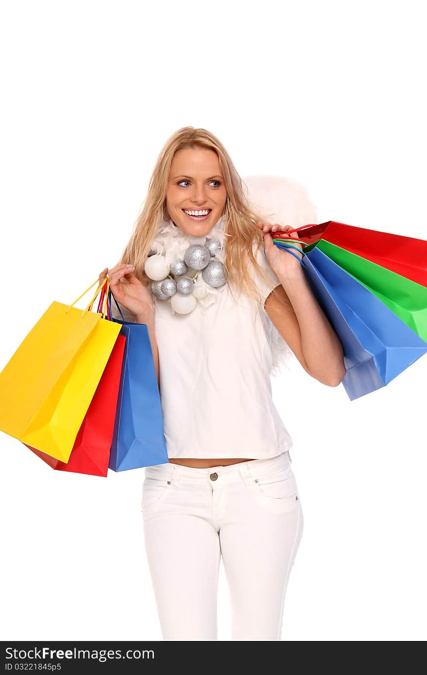 blond angel with some colored shopping bags. blond angel with some colored shopping bags