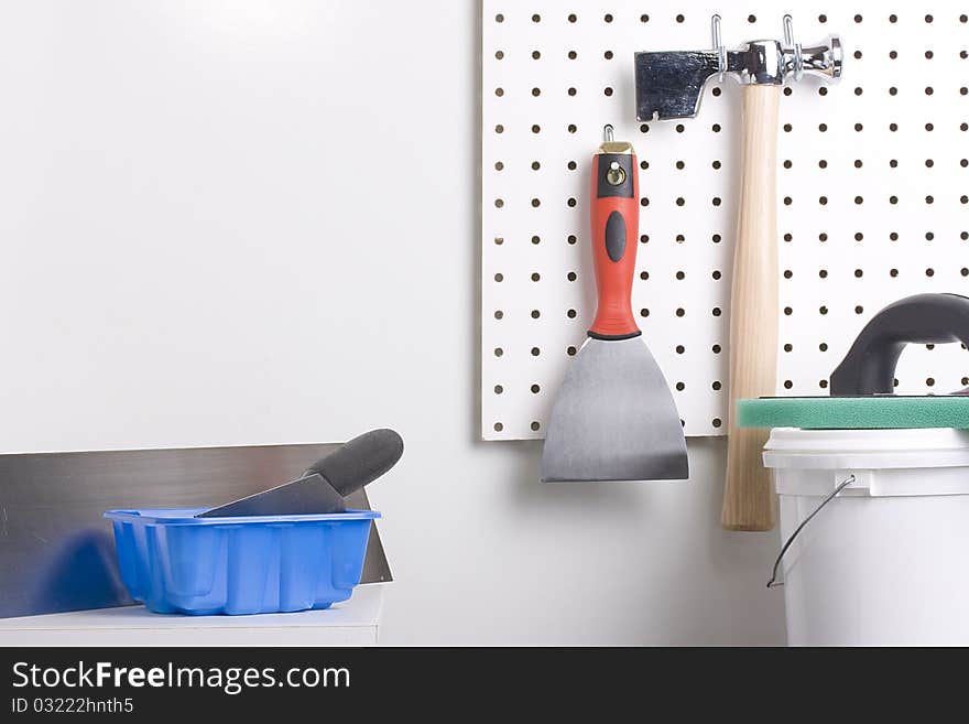 Different tools used for wall plastering and home improvement. Different tools used for wall plastering and home improvement.