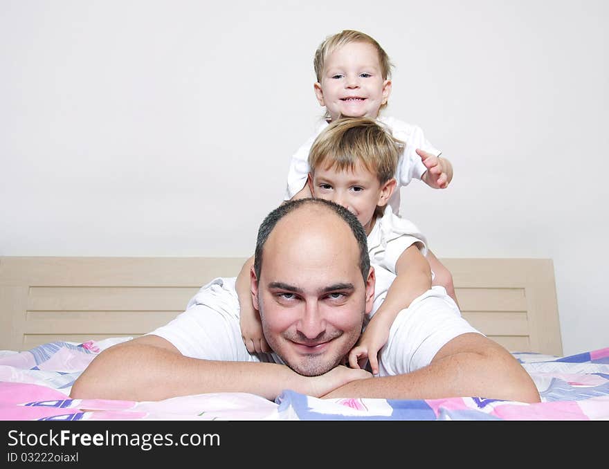 Father and two kids at home