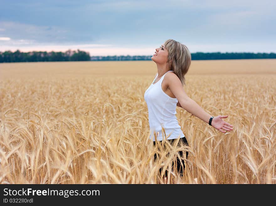 A girl in a wheat field