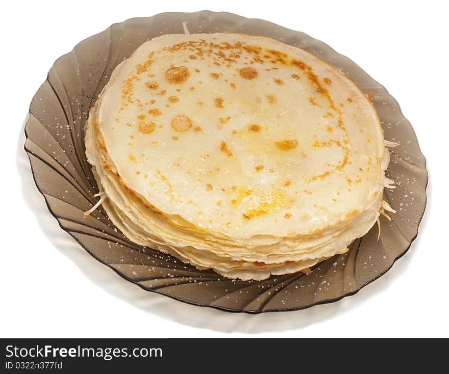 Thin flour traditional Russian pancakes on a plate