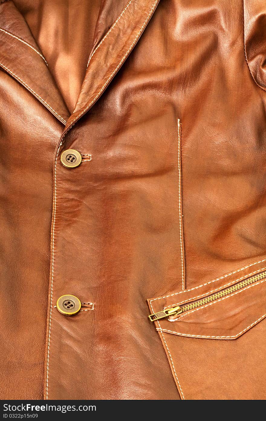 Detail of clothing and leather in brown. Detail of clothing and leather in brown