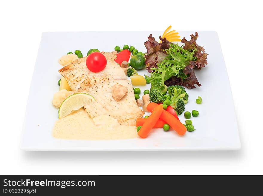 Seafood with vegetables and herbs on a ceramic platter. Seafood with vegetables and herbs on a ceramic platter