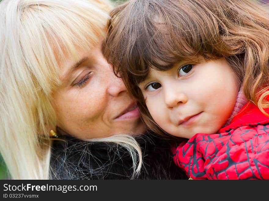 Happy mother and daughter portrait