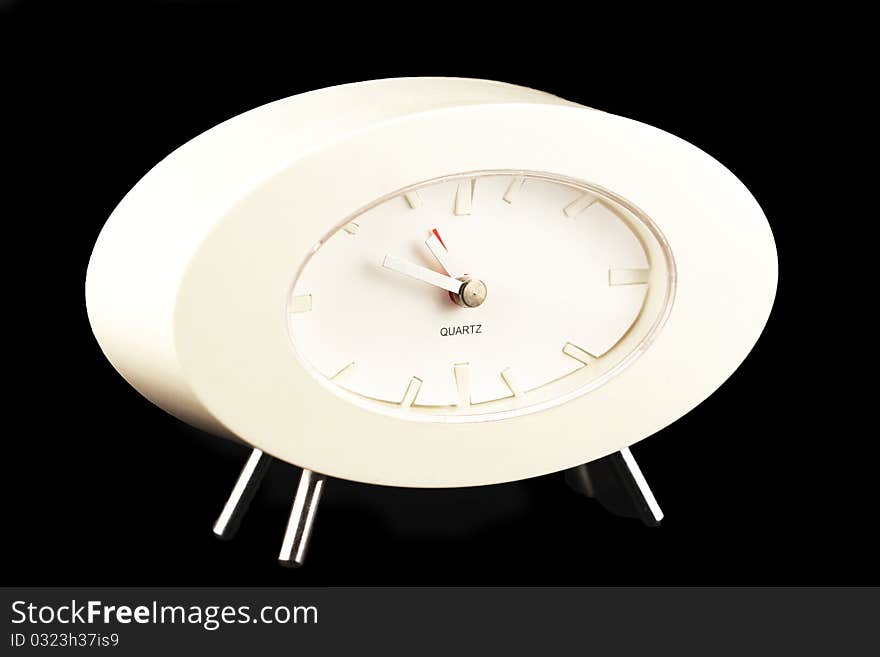 Modern desk clock on black background. Modern desk clock on black background