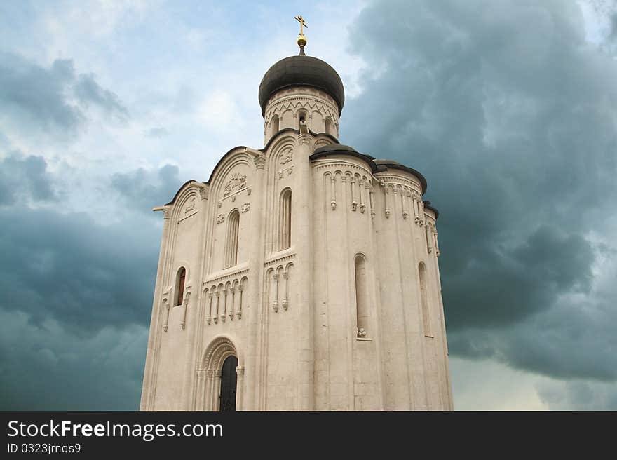 The image of ancient church photographed against the sky