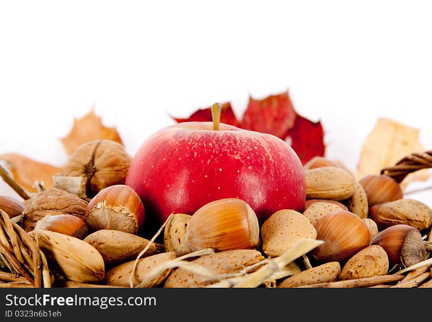 Nuts And Appel In A Basket