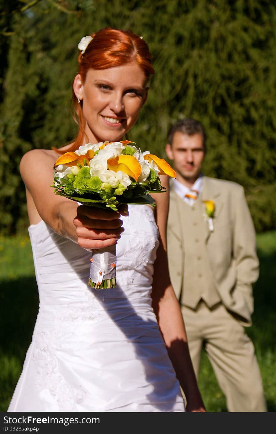 Young bride with flowers.