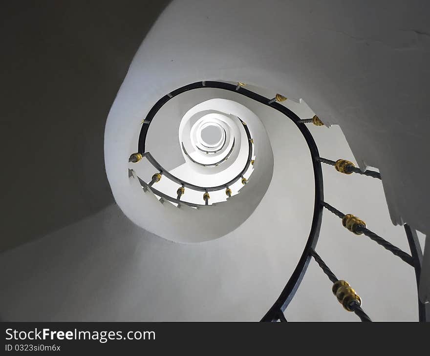 That's a beautiful spiral stair found in a modern building