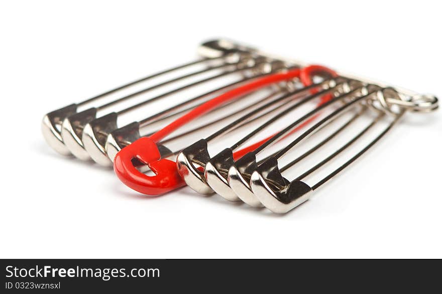 Safety pins with one red