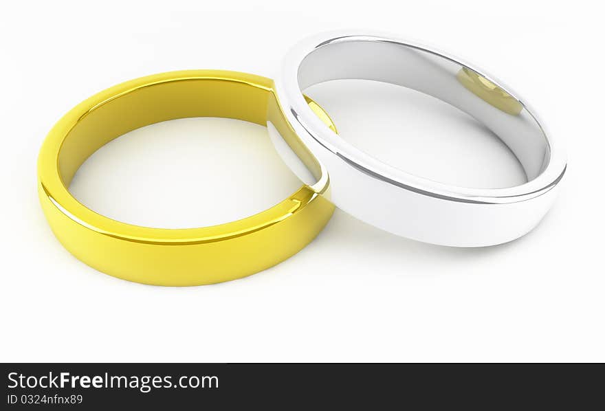 Gold and platinum wedding rings on a white background