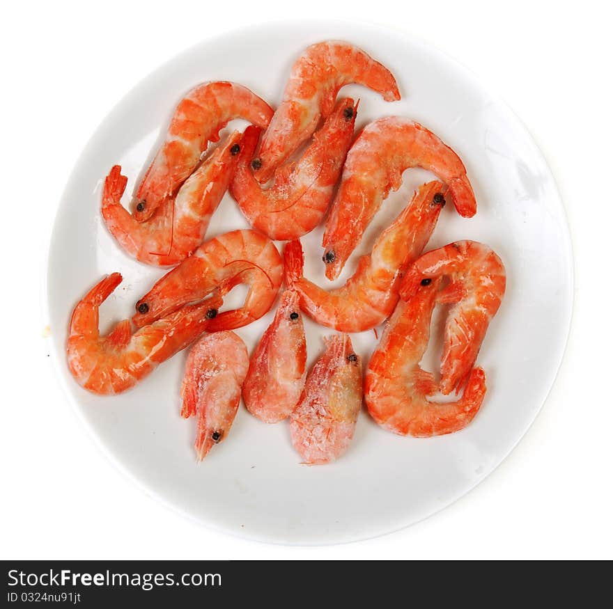 Plate frozen prawns insulated on white background