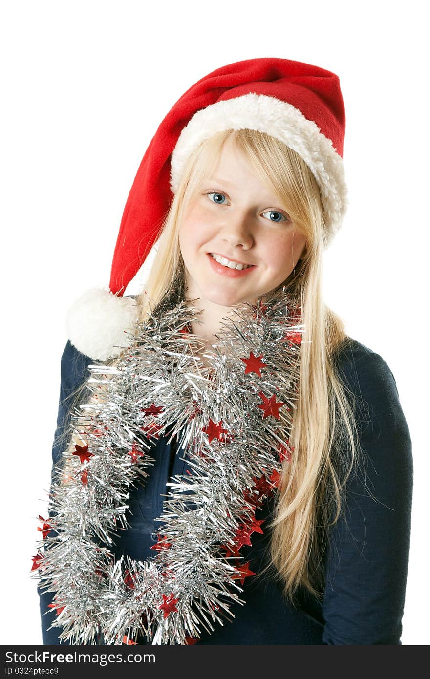 A beautiful young blonde in a Santa hat on a white background