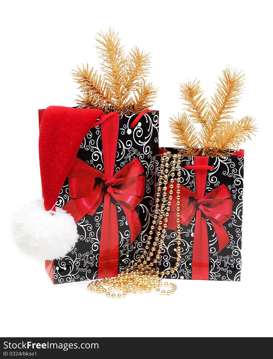 Two cristmases gift package, decoration, hat santa