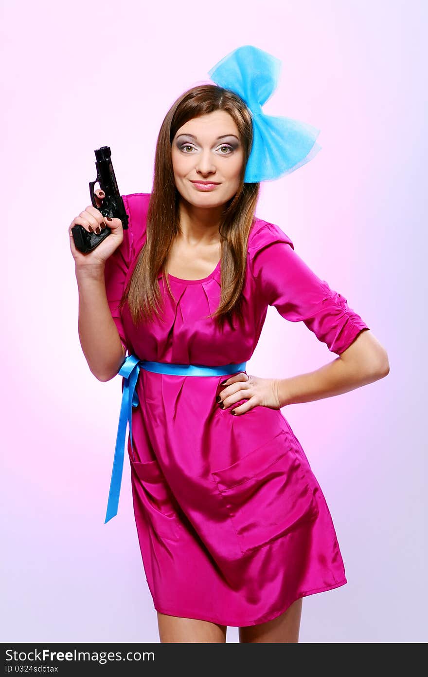 Attractive and spy woman with assault rifle on white background. Attractive and spy woman with assault rifle on white background