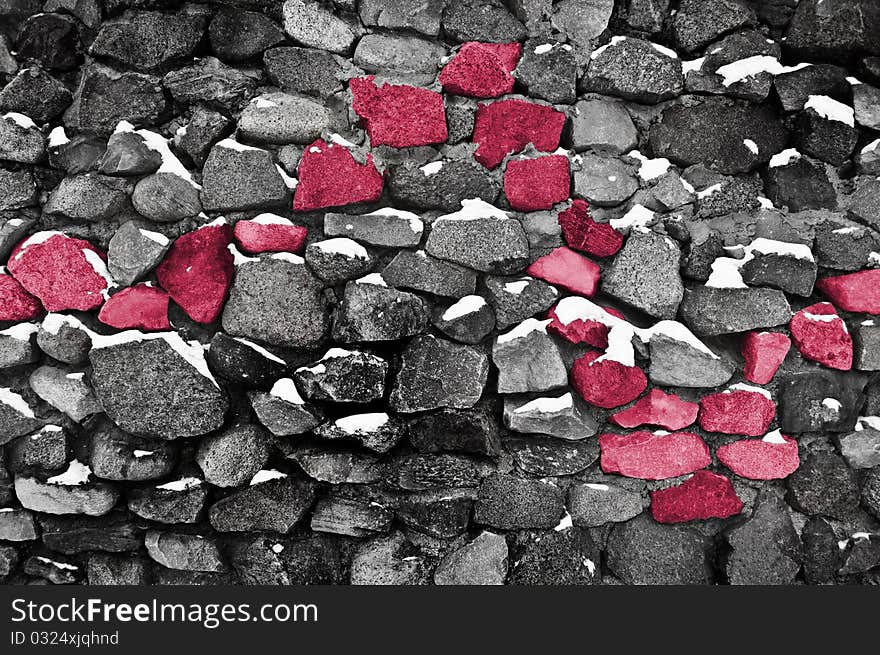 Close up of stone wall with red line and snow. Close up of stone wall with red line and snow