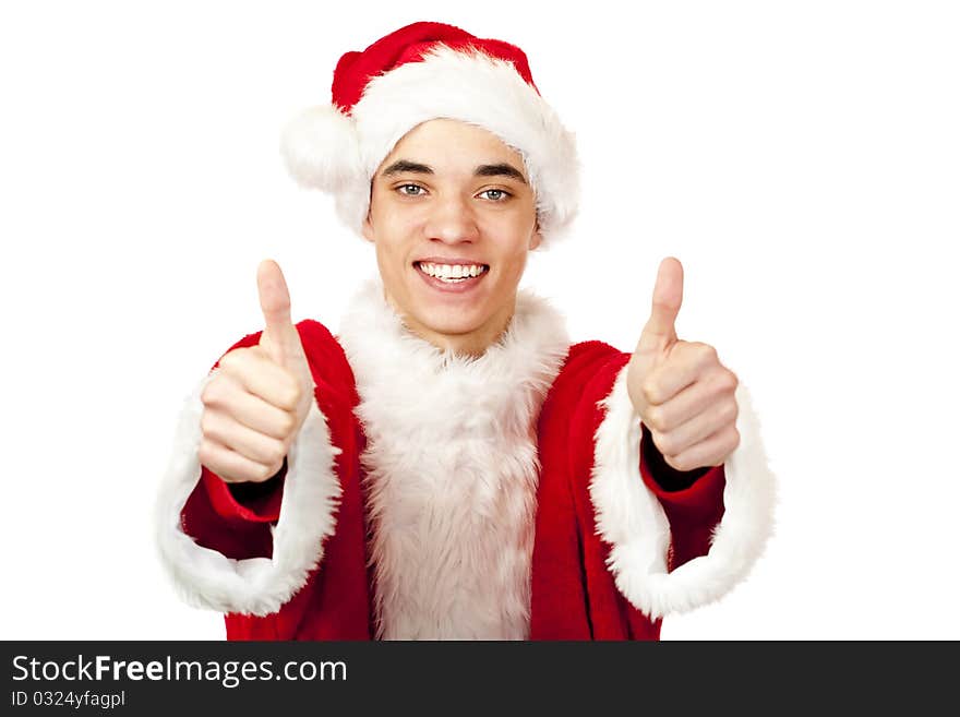 Male santa claus teenager shows both thumbs up