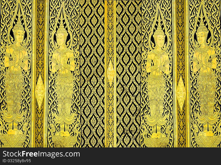 Thai traditional style door painting, coated with real gold plate.