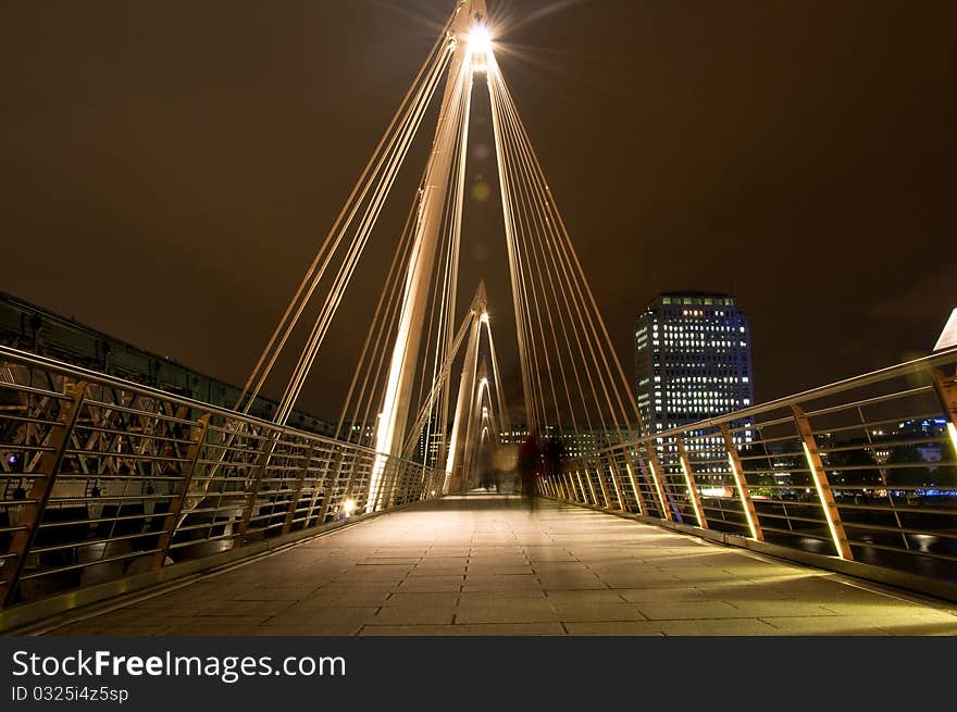 A shot of the Bridge going over the thames, close to the London eye in Westminster. This was taken with a long exposure to creat the blurred affect of the people crossing the bridge. A shot of the Bridge going over the thames, close to the London eye in Westminster. This was taken with a long exposure to creat the blurred affect of the people crossing the bridge.