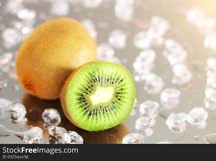 Kiwi and pieces of ice